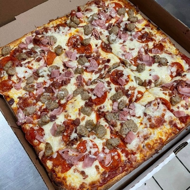 a large square meats pizza